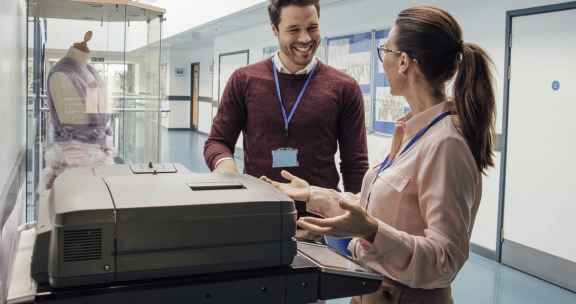 Teachers with photocopiers