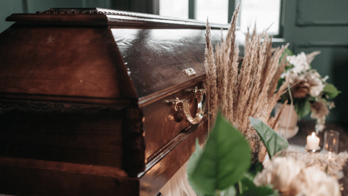 coffin and flowers