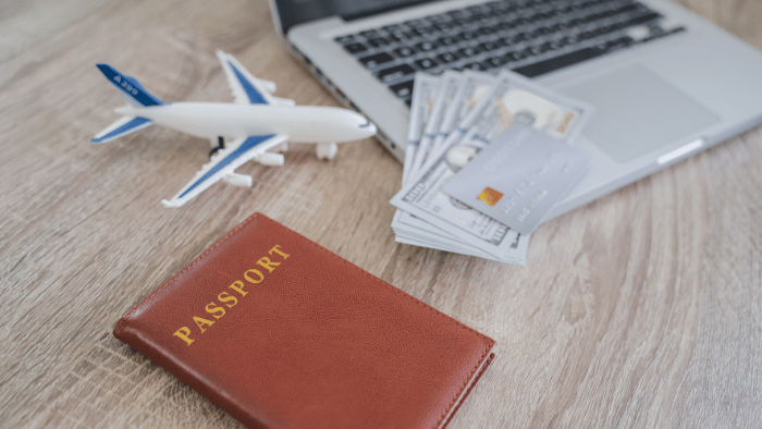Passport, money and a mini plane 
