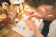 Person decorating an egg