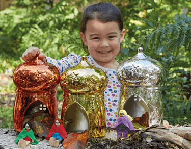 Child playing with toys outdoors