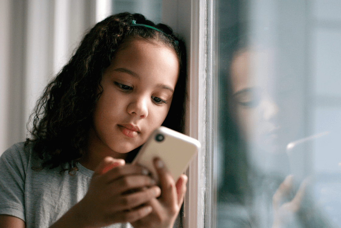 A child using their mobile phone