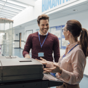 Teachers with photocopier